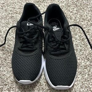 Women’s Nikes—never worn